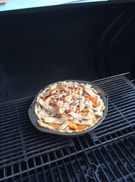 Peach pie on the grill